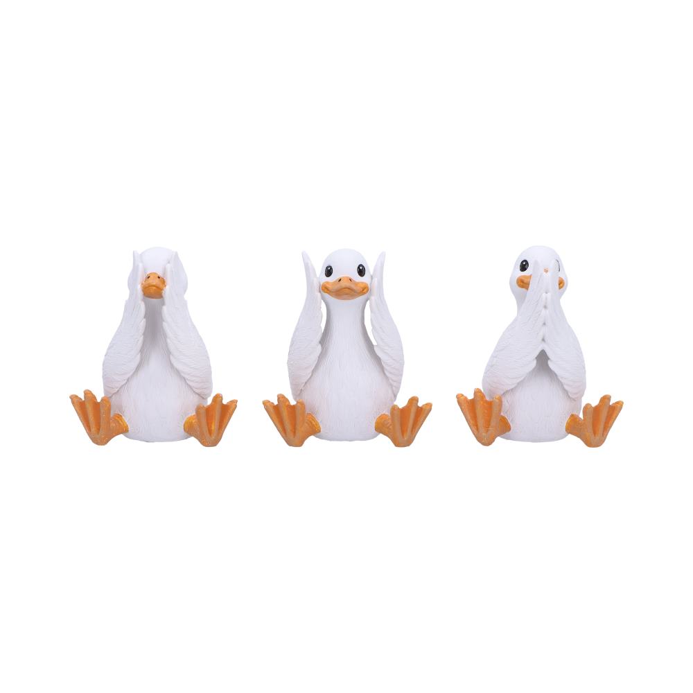 Comedic set of three white geese figurines