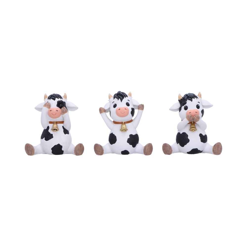 Set of three figurines in see no evil, hear no evil, and speak no evil poses.