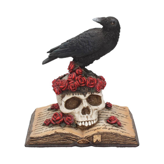 A peaceful Raven perches atop a rose covered skull that is placed upon an open book.