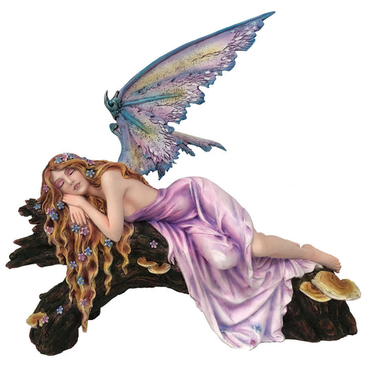This fantasy fairy rests on a toadstool covered branch.