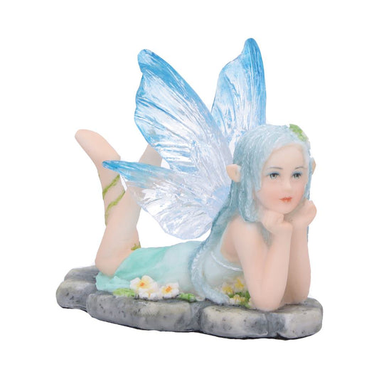 Nature Fairy Figurine is posed lying on her front with clear blue wings