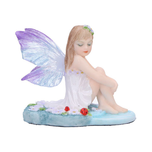 Elegant fairy figurine with a tranquil pose and nature-inspired details.