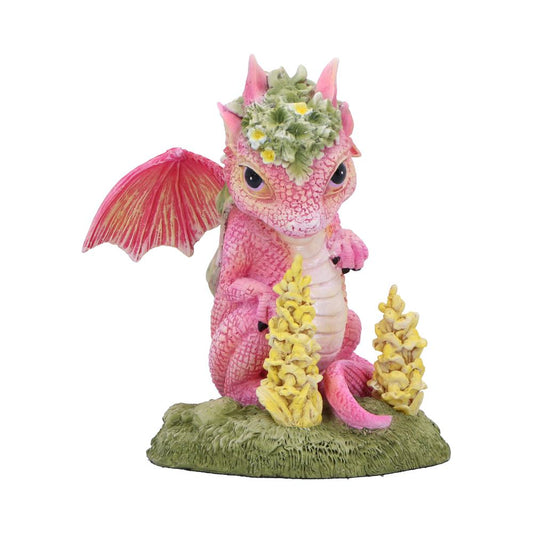 Whimsical and botanical-inspired fantasy dragon figurine.