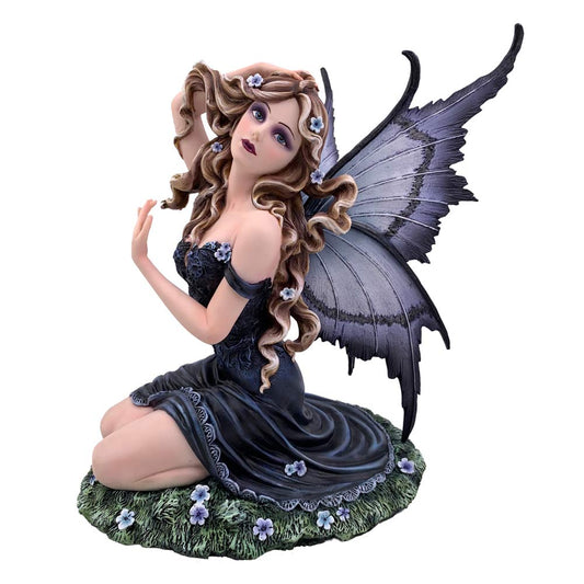 Resin figurine of a kneeling fairy adorned with lavender accents