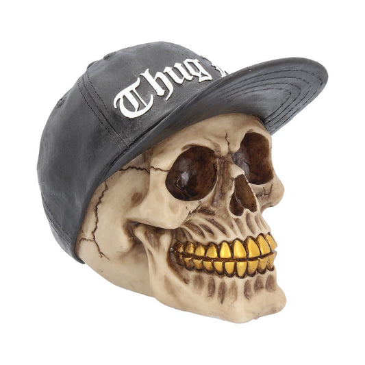 Skull with Gold Teeth and Baseball Cap Figurine.
