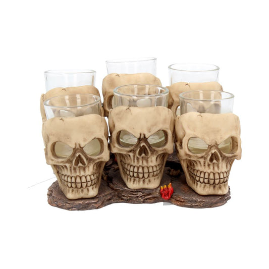 Six, resin and glass, shot glasses on a small stone-look plinth.