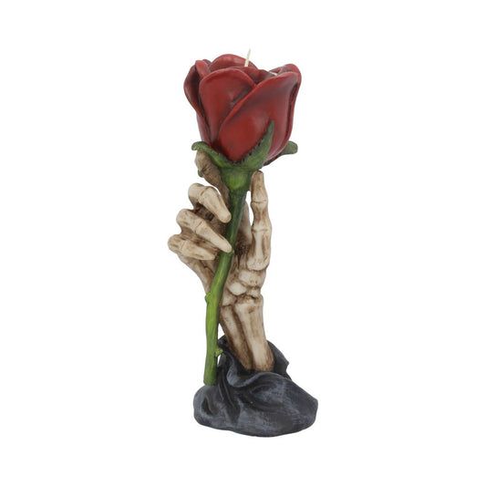Romantic skeleton hand tealight holder.